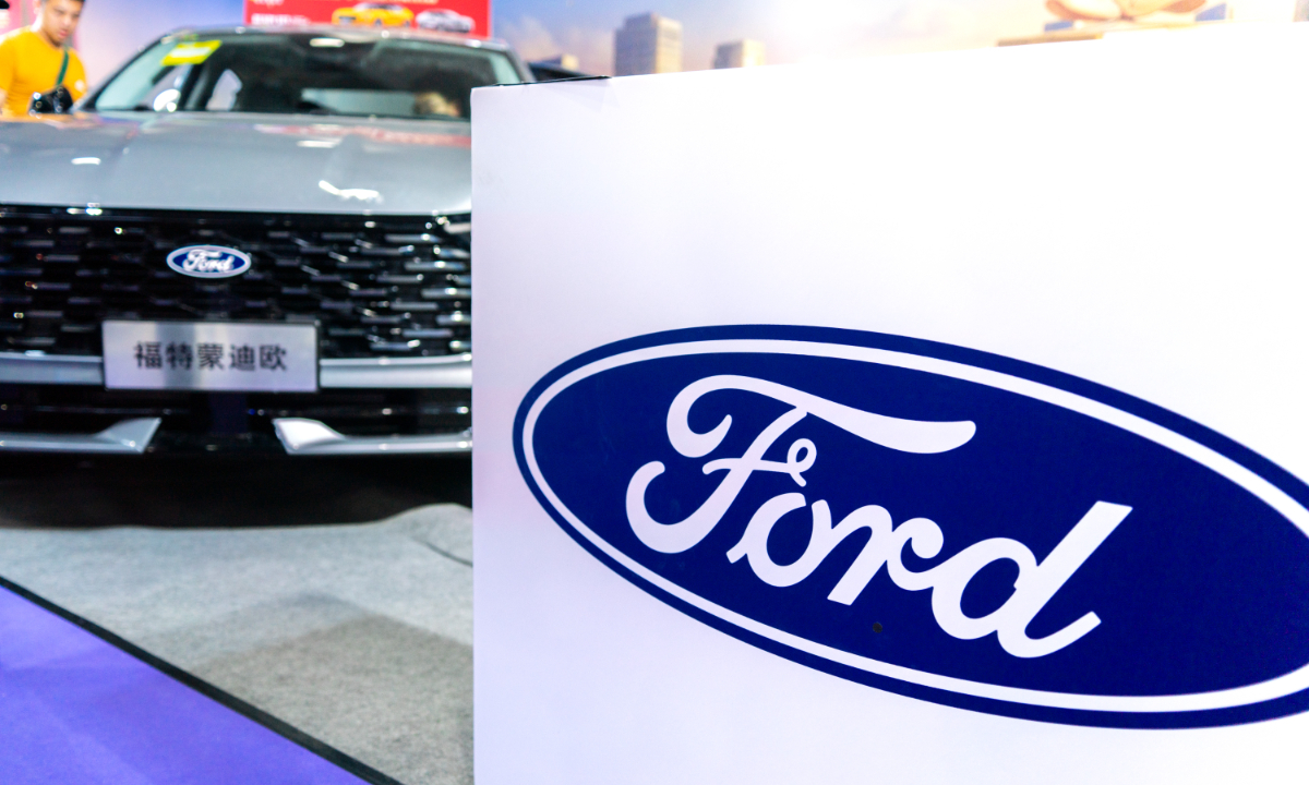 A Ford logo is displayed above the automaker's booth at an international auto show in Guangzhou on May 1, 2026. Photo: VCG