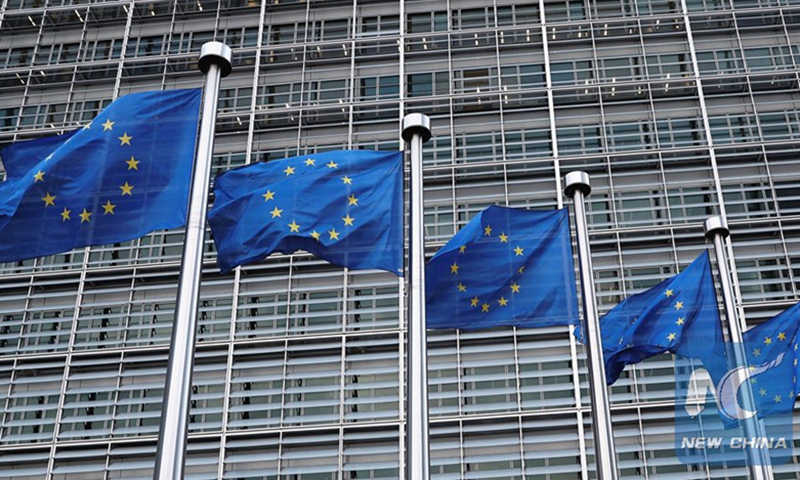 The European Union flags in front of EU headquarters in Brussels, Belgium. Photo: Xinhua