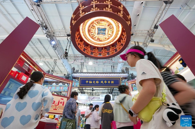 People visit the themed exhibition area for culture and tourism services during the 2026 China International Fair for Trade in Services (CIFTIS) at Shougang Park in Beijing, capital of China, Sept. 12, 2026. The 2026 CIFTIS, running from Sept. 9 to 13 at Shougang Park in Beijing, has brought together 413 exhibitors at the themed exhibition area for culture and tourism services, showcasing emerging models of cultural and tourism integration. (Xinhua/Ju Huanzong)
