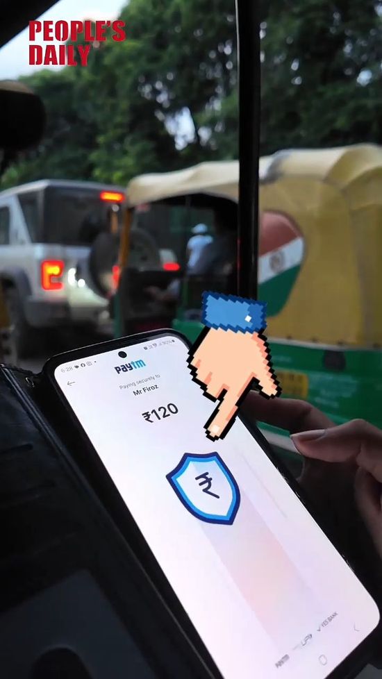 Riding an auto rickshaw: trying India's cashless payments