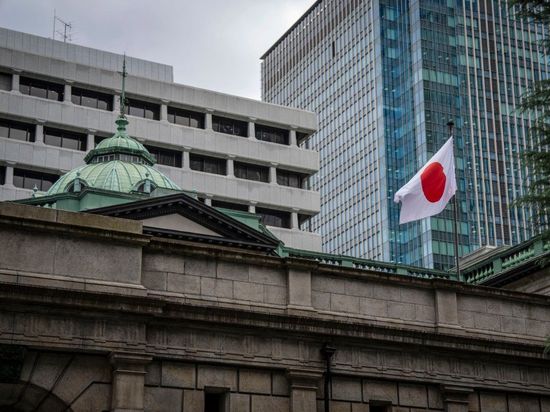 Japan's central bank lifts policy rate to 31-year high, signals more hikes