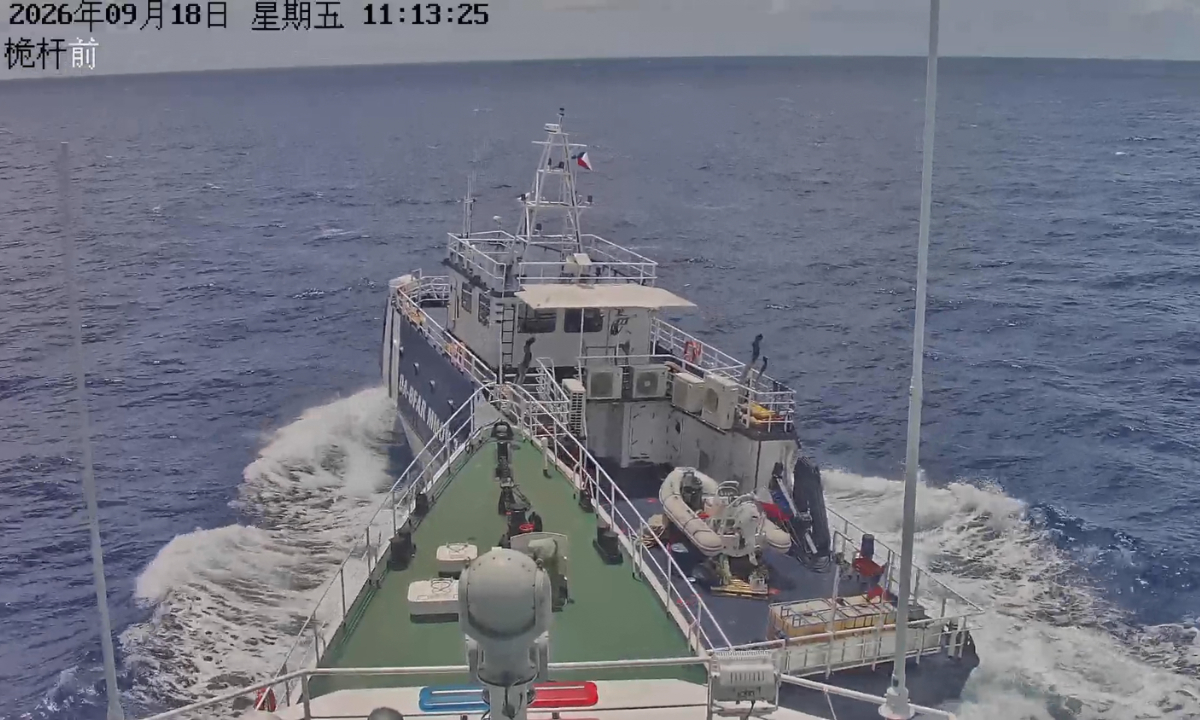 A Philippine vessel deliberately cuts across the path of the Chinese coast guard vessel Sanzhou'ao, causing a collision on September 18, 2026.