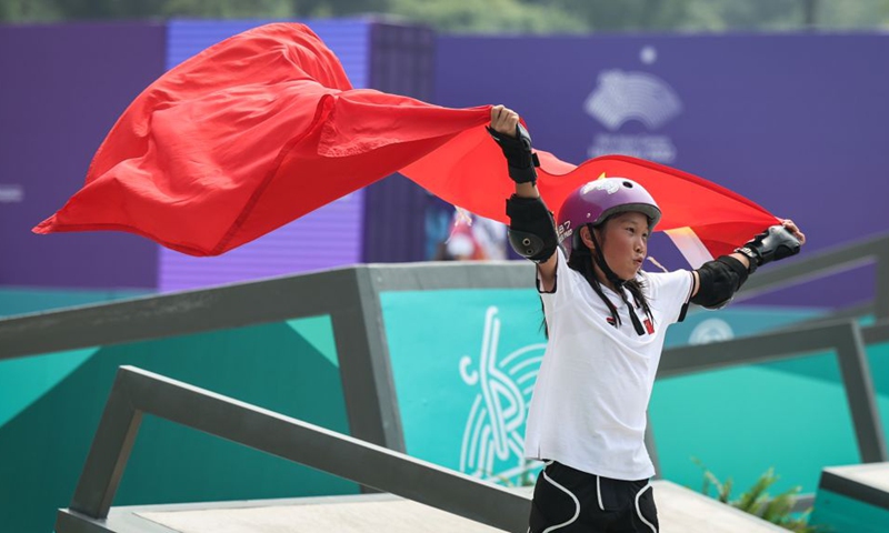 This file photo shows China's Cui Chenxi celebrating after winning the skateboarding women's street at the 19th Asian Games in Hangzhou, Sept. 27, 2023. (Xinhua/Pan Yulong)