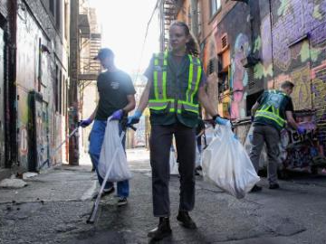 Volunteers collect garbage from street to mark World Cleanup Day in Canada
