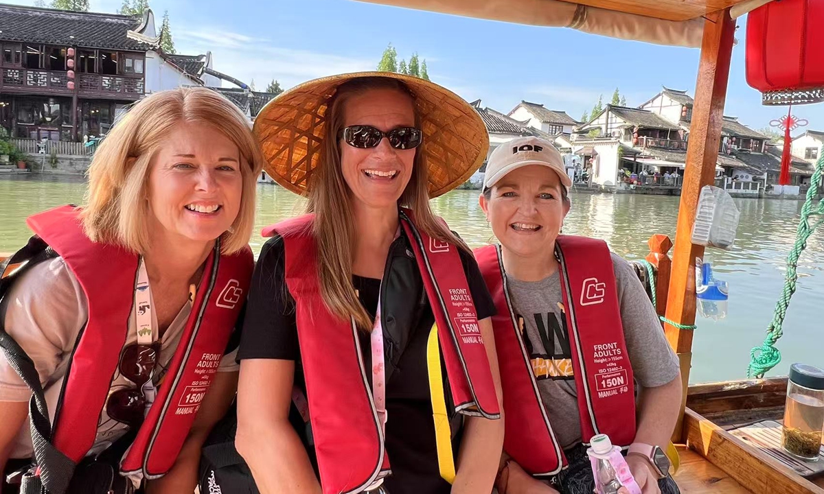 Teachers from Muscatine High School take a boat ride to experience a traditional water town during their visit to China in April 2024. Photo: Courtesy of Muscatine High School