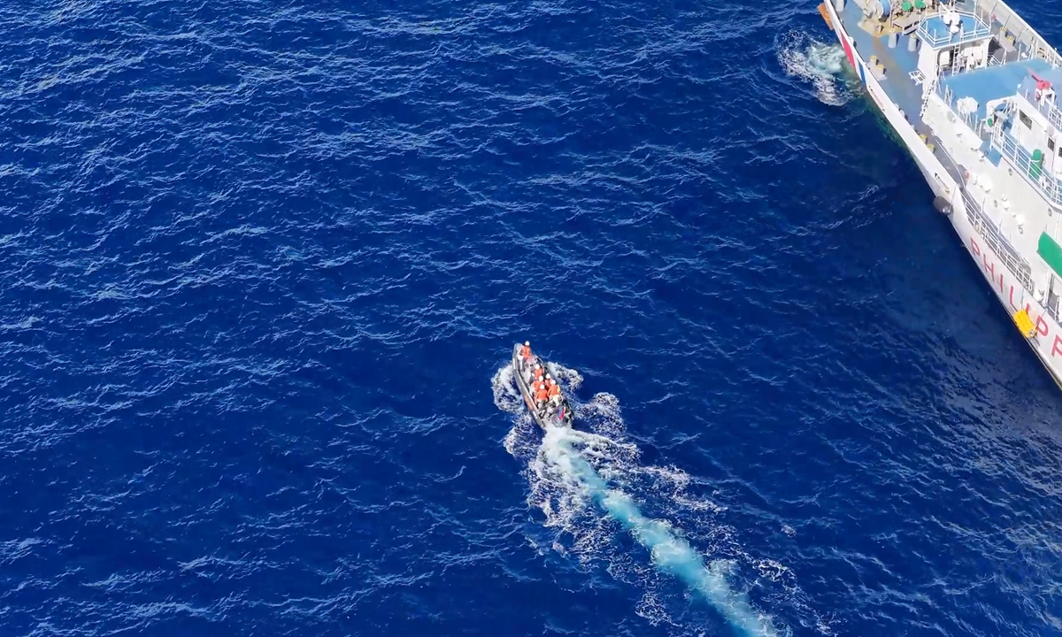 Screenshot from video obtained by the Global Times on July 21, 2026 shows the transfer of injured Philippine personnel near Ren'ai Jiao, which was overseen and assisted by the China Coast Guard. Photo: Courtesy of the China Coast Guard