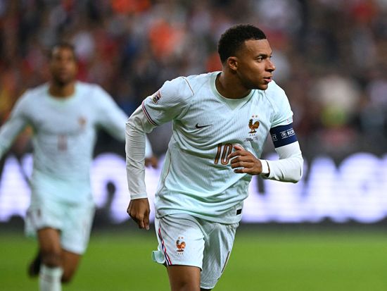 Mbappe scores but suffers knee injury as Zidane gets debut France win