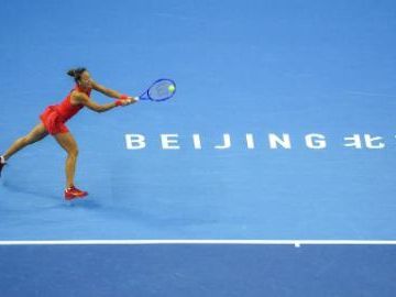 Zheng advances into China Open third round as Kalinskaya withdraws