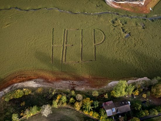 Cry for help as French-Swiss lake dries up