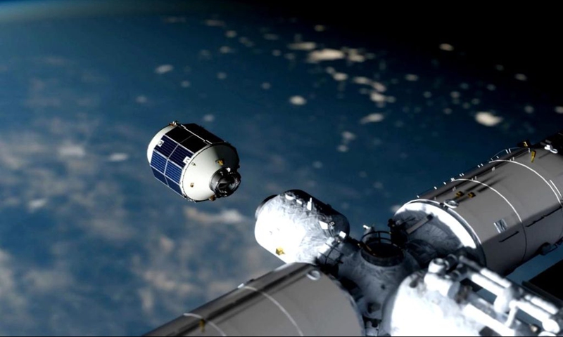 This simulated image shows China's next-generation cargo craft Qingzhou docking with China's space station in orbit. (Innovation Academy for Microsatellites of the Chinese Academy of Sciences/Handout via Xinhua)