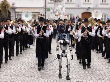 Unitree G1 humanoid robot attends parade of Ljubljana Wind Orchestra in Slovenia