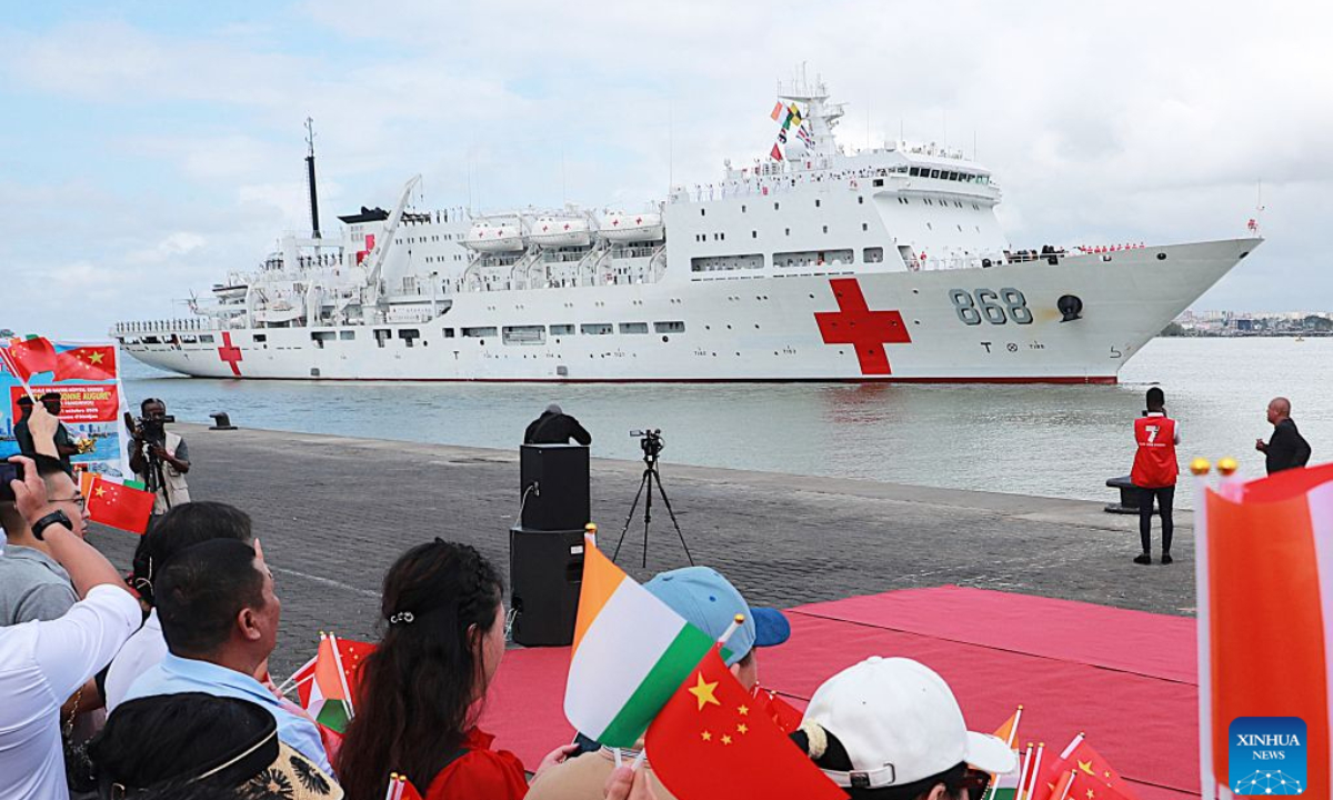 The Chinese People's Liberation Army Navy hospital ship Auspicious Ark arrives in Abidjan, Cote d'Ivoire, Oct. 14, 2026. Auspicious Ark arrived in Abidjan, the economic capital of Cote d'Ivoire, on Wednesday to begin a friendly visit and provide medical services, marking the first visit by a Chinese naval hospital ship to the country.The hospital ship, which is carrying out Mission Harmony-2026, docked at Abidjan at about 10:00 a.m. local time (1000 GMT). (Photo by Yvan Sonh/Xinhua)