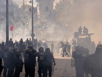 Around 550,000 people take part in protests across France, about 400 arrested: minister