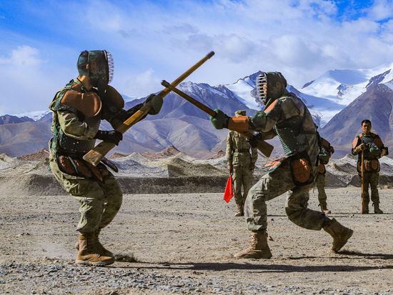 Army soldiers practice bayonet fighting skills