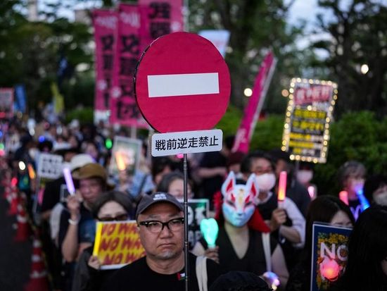 Japanese protesters rally against Takaichi government's military buildup, constitutional revision