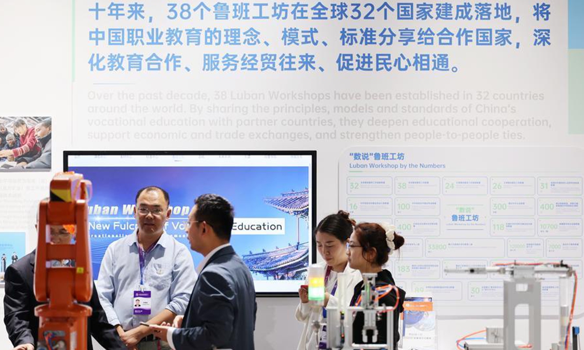 Participants view exhibits at an exhibition during the World Vocational and Technical Education Development Conference 2026 in Tianjin, north China, Oct. 16, 2026. (Xinhua/Li Ran)