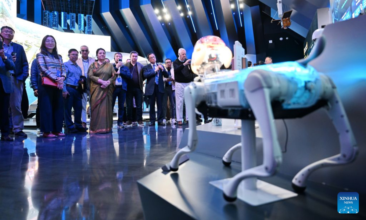 Participants of the 2026 Global Governance Forum (Xiong'an) visit a smart-city science and innovation center in Xiong'an New Area, north China's Hebei Province, Oct. 23, 2026. The 2026 Global Governance Forum (Xiong'an) kicked off here on Friday and will last till Sunday. Participants from various countries and regions visited a smart-city science and innovation center and the construction site of the start-up zone of Xiong'an New Area ahead of the forum. (Xinhua/Mu Yu)