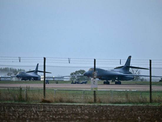 Two men charged with national security offenses following RAF Fairford incident