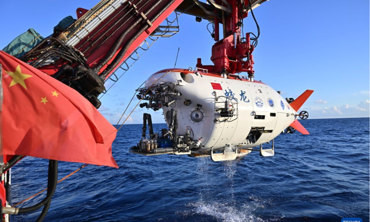 China’s upgraded manned deep-sea submersible Jiaolong is recovered on October 2, 2026, after completing its 465th dive, during which it reached a depth of 7,056.9 meters. Photo: Xinhua