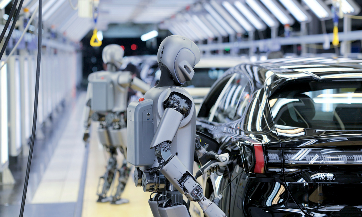 Dozens of UBTECH industrial humanoid robots carry out training tasks at a smart factory in the Qianwan New Area in Ningbo, East China’s Zhejiang Province, on March 1, 2025. Photo: VCG