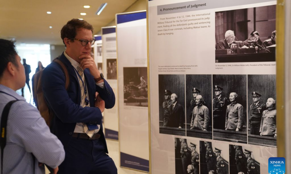 People view exhibits at an exhibition marking the 80th anniversary of the opening of the Tokyo Trial at the UN Headquarters in New York, Oct. 26, 2026. An exhibition marking the 80th anniversary of the opening of the Tokyo Trial opened at UN Headquarters in New York on Monday.Titled Justice and Peace for All Humanity, the exhibition features historical photographs, archival documents and publications on the investigation and prosecution of Japanese war crimes during World War II. (Xinhua/Zhang Fengguo)