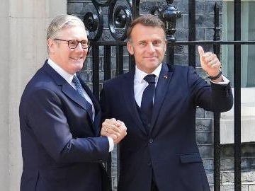 Britain, France agree to coordinate nuclear deterrence, unveil new migration scheme