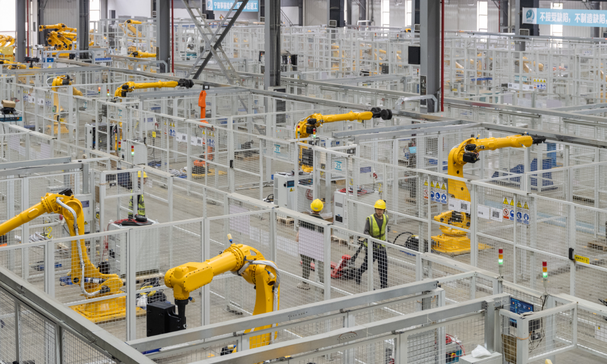 Robotic arms produce robots at a factory of Estun Automation in Nanjing, East China's Jiangsu Province, on April 7, 2025. Estun Automation is a leading enterprise in China's industrial robotics. From January to November 2024, the output of industrial robots in Nanjing exceeded 32,000 sets. Photo: VCG