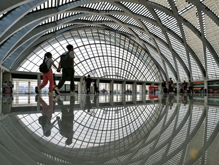 China's summer rush ends with record travel, freight figures
