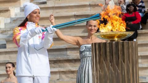 Olympic flame for 2026 Winter Games handed over to Italy in Athens (updated)