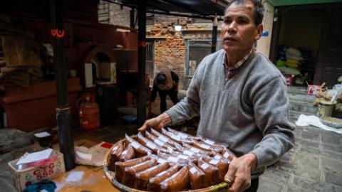 Workers prepare molasses for upcoming Maghe Sankranti Festival in Lalitpur, Nepal