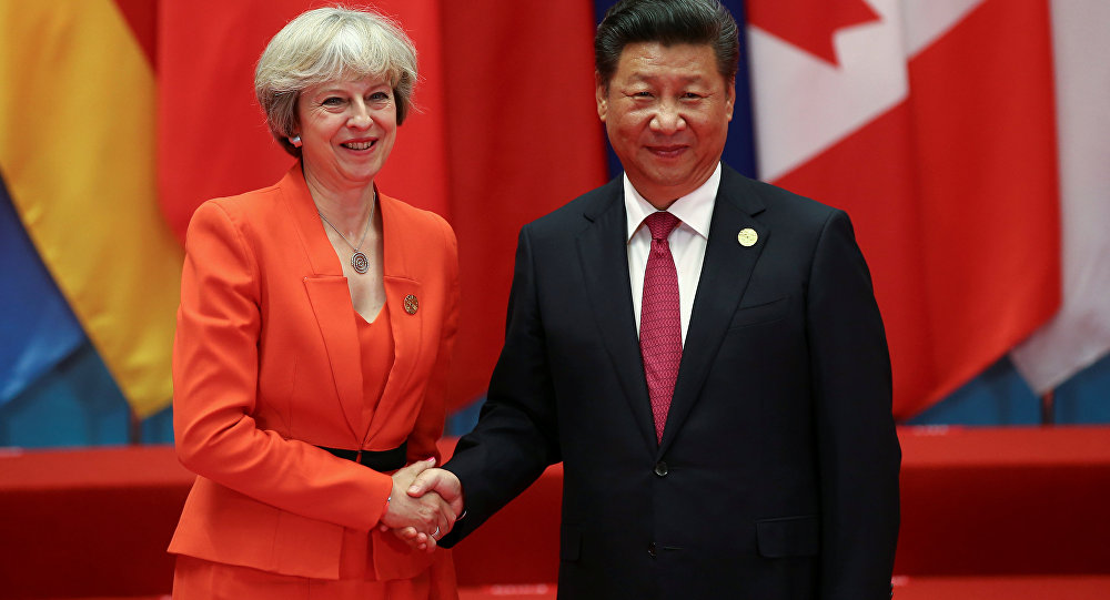 Chinese President Xi Jinping (R) shakes hands with Britain's Prime Minister Theresa May during the G20 Summit in Hangzhou, Zhejiang province, China September 4, 2016.