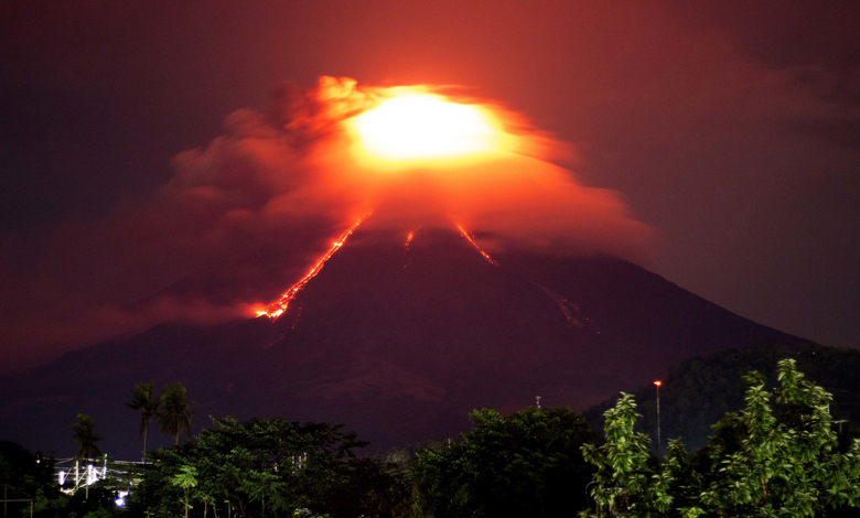 Lava cascades down the slopes of Mayon volcano as seen from Legazpi city, Albay province, around 340 kilometers (210 miles) southeast of Manila, Philippines, Monday, Jan. 15, 2018. More than 9,000 people have evacuated the area around the Philippines’ most active volcano as lava flowed down its crater Monday in a gentle eruption that scientists warned could turn explosive. (AP Photo/Earl Recamunda)