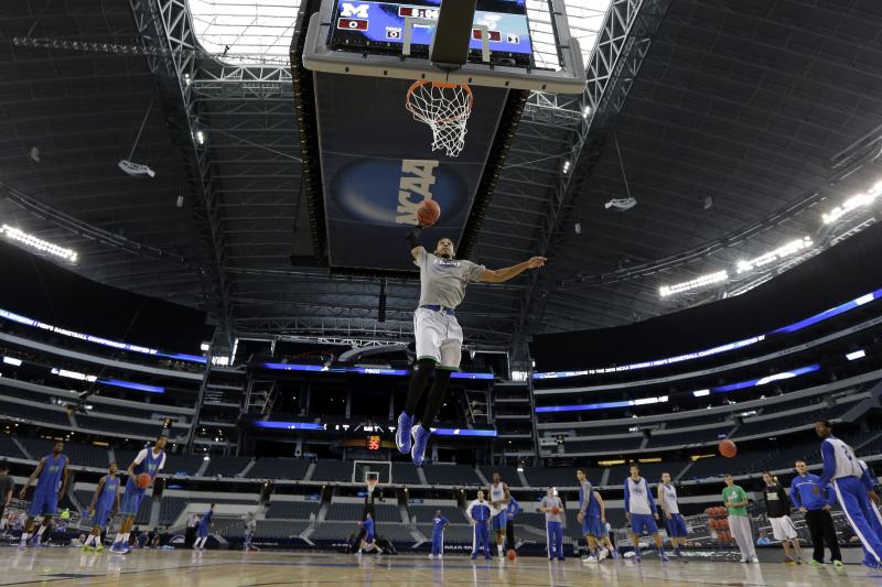 Florida Gulf Coast's Sherwood Brown dunks during practice for a regional semifinal game in the NCAA college basketball tournament, Thursday, March 28, 2013, in Arlington, Texas. Florida Gulf Coast faces Florida on Friday. (AP Photo/David J. Phillip)