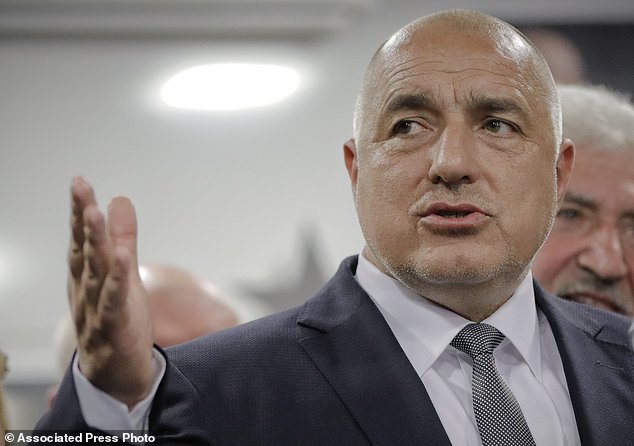 Bulgarian ex-Premier Boiko Borisov, leader of the center-right GERB party, gestures during a statement at the party's headquarters, in Sofia, Bulgaria, Sunday, March 26, 2017. Bulgaria's center-right GERB party of former Prime Minister Boiko Borisov leads by 4 percent in Sunday's parliamentary elections , according to two separate exit polls conducted by the Alpha Research and the Gallup International Bulgaria polling agencies. (AP Photo/Vadim Ghirda)