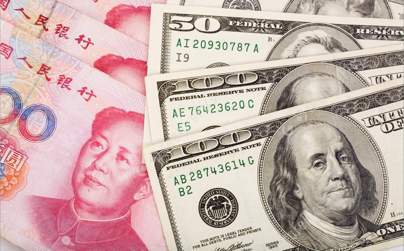 chinese-yuan-and-us-dollar-stock-photo-465811.jpg