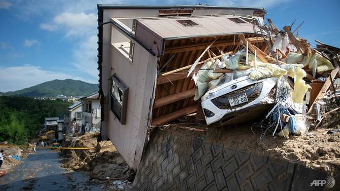record-floods-in-japan-have-killed-more-than-100-people-as-authorities-warn-about-the-risk-of-landslides--1531136012183-6.jpg