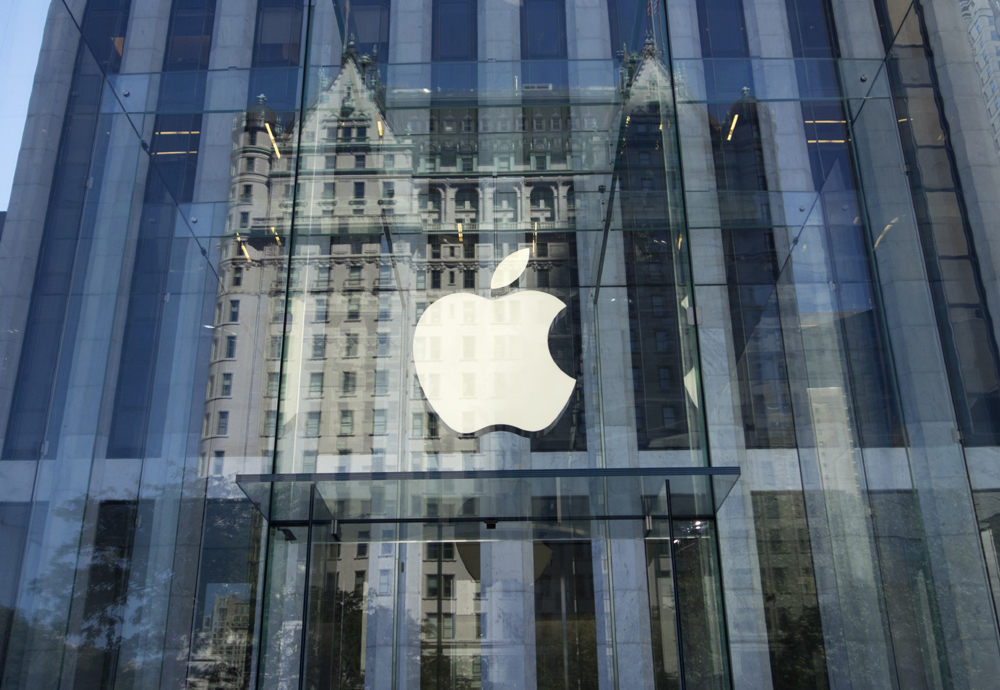 In this file photo taken on September 14, 2016 the Apple logo is seen at the entrance to the Fifth Avenue Apple store in New York. [File photo: AFP/Don Emmert]