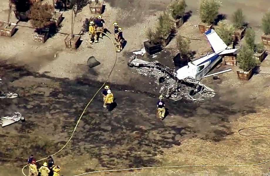 This still photo taken from video provided by KTTV-TV/foxla.com shows the wreckage of a small plane that crashed on the border between a nursery and Brackett Field Airport in La Verne, Calif., killing the pilot, the lone occupant, Monday, Oct. 1, 2018. Federal Aviation Administration spokeswoman Elizabeth Cory said the plane crashed while approaching the airport. Monday's crash was the second in two days at the same airport. On Sunday, Sept. 30, one person was killed and another seriously injured when an aircraft went down inside the nursery next to the same airfield. (KTTV-TV/foxla.com via AP) Photo: AP / KTTV-TV/foxla.com