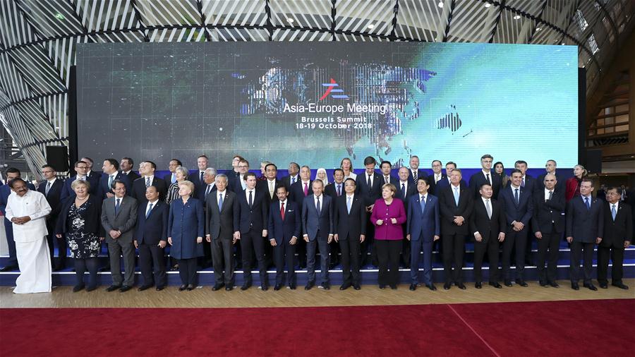 Leaders attending the 12th Asia-Europe Meeting (ASEM) Summit pose for a group photo in Brussels, Belgium, Oct. 19, 2018. Chinese Premier Li Keqiang attended the summit here on Friday. [Photo: Xinhua/Ding Haitao]