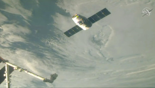 In this image taken from NASA Television, the SpaceX Dragon cargo spacecraft approaches the robotic arm for docking to the International Space Station, Saturday, Dec. 8, 2018. A communication drop-out has delayed a Christmas delivery at the International Space Station. [Photo: AP/ NASA TV]