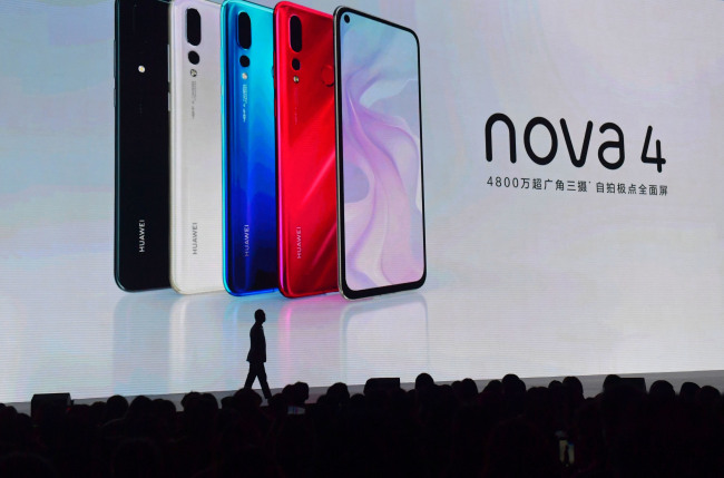 He Gang, president of Huawei's smartphone operations, introduces the Nova-4 at a news conference in Changsha, Hunan Province, December 17, 2018. [Photo: IC]