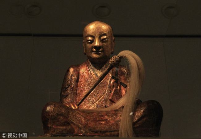 The Zhanggong Zushi Buddha statue at an exhibition in Hungary in March 2015. [File photo: VCG]