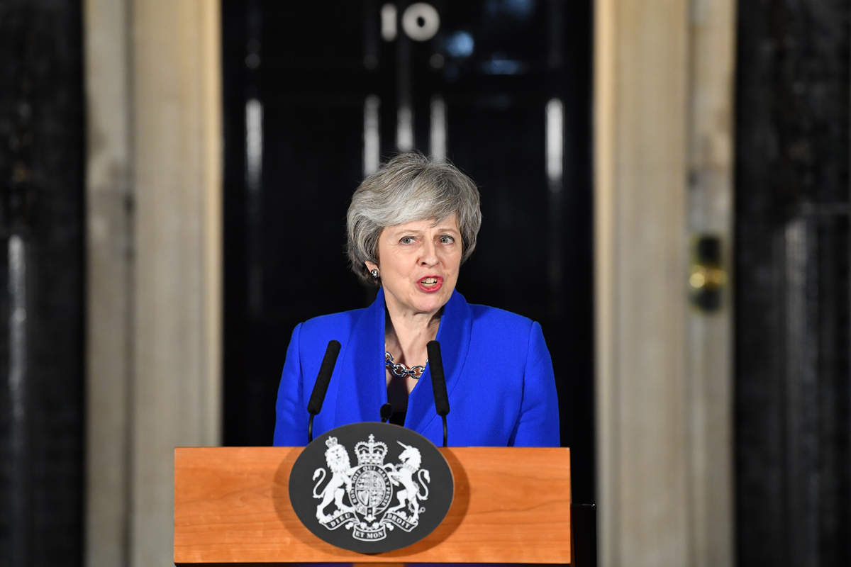 Britain's Prime Minister Theresa May delivers a speech to members of the media in Downing Street in London on January 16, 2019, after surviving a vote of no confidence in her government. British Prime Minister Theresa May's government saw off a vote of no confidence in parliament on Wednesday, called after MPs overwhelmingly rejected the Brexit deal.[Photo: AFP/Ben STANSALL]