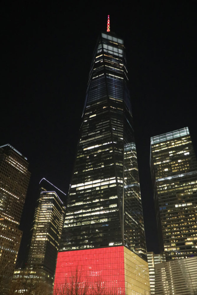 The One World Trade Center in New York City is seen lit up on Sunday February 3, 2019 to celebrate the upcoming Chinese New Year. This is the first time that the tallest building in the United States is glowing for the celebration of the Chinese New Year. The Lunar New Year, which will be the year of the pig, starts on February 5. [Photo: China Plus/Qian Shanming]