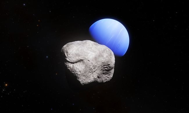 A handout released on February 20, 2019 shows an artist's impression of the outermost planet of the Solar System, Neptune, and its small moon Hippocamp. Hippocamp was discovered in images taken with the NASA/ESA Hubble Space Telescope. Whilst the images taken with Hubble allowed astronomers to discover the moon and also to measure its diameter, about 34 kilometres, these images do not allow us to see surface structures. [Photo: AFP]