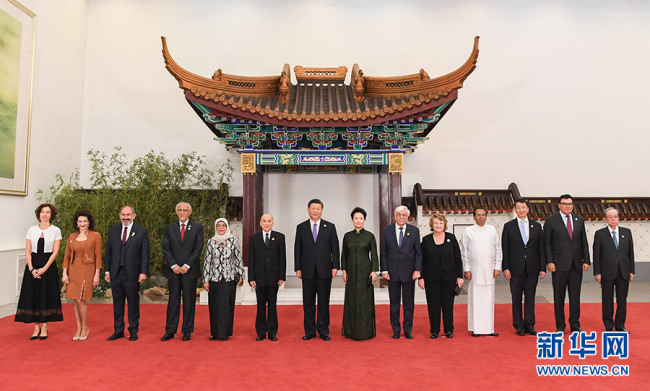 Chinese President Xi Jinping and his wife Peng Liyuan host a banquet in honor of guests who are in Beijing for the upcoming Conference on Dialogue of Asian Civilizations on May 14, 2019. [Photo: Xinhua]