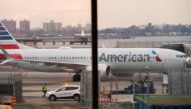 In this file photo taken on March 13, 2019, an American Airlines 737 Max sits at the gate at LaGuardia airport in New York. [Photo: AFP/Don Emmert]
