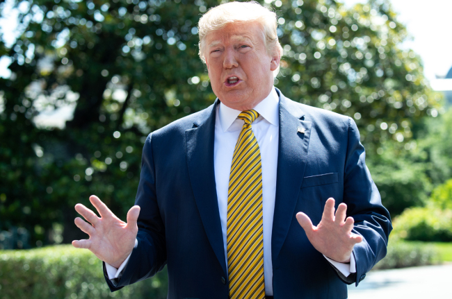 United States President Donald Trump speaks to the media prior to departing on Marine One from the South Lawn of the White House in Washington, D.C. on June 22, 2019. [File Photo: AFP/ Saul Loeb.]